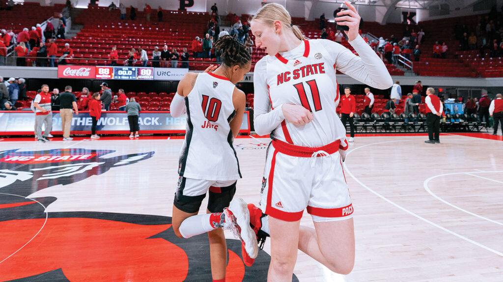 Aziaha James and Maddie Cox celebrate with a little dance. 