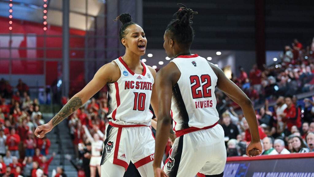 Aziaha James and Saniya Rivers express their joy with a chest bump. 