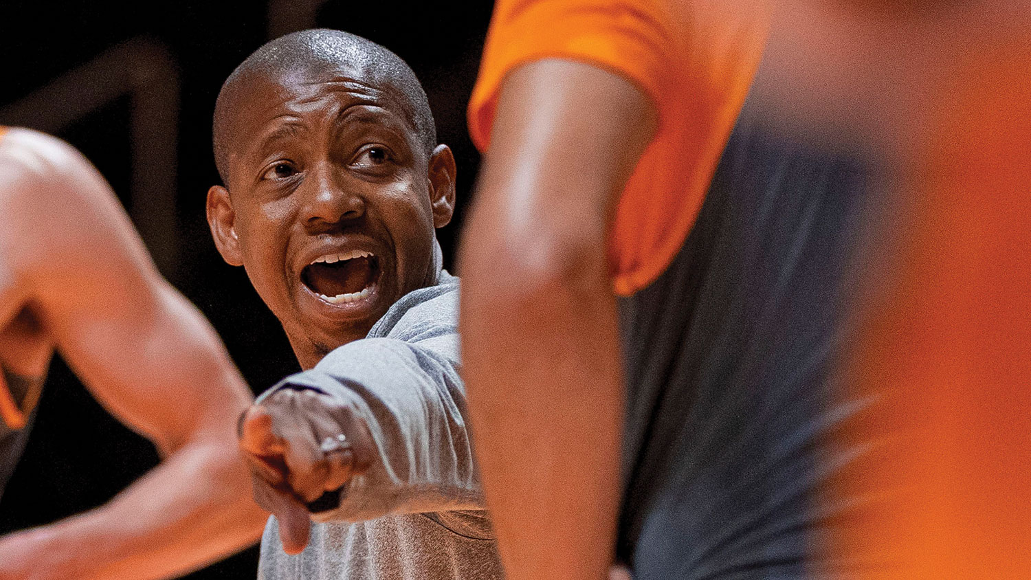 Alum Justin Gainey directs practice for the University of Tennessee men's basketball team. Gainey is the associate head coach for the Volunteers.