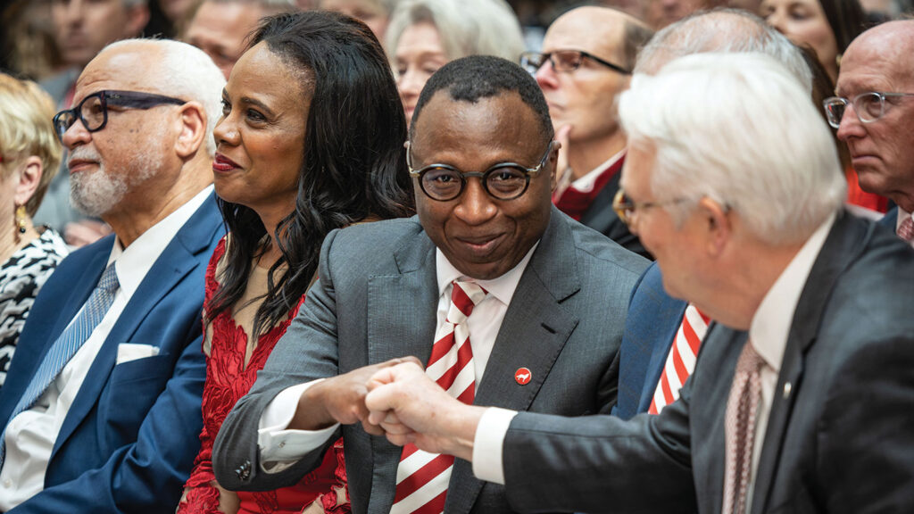 Kevin Howell gives a nod to outgoing Chancellor Randy Woodson.